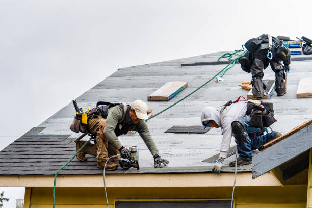 Professional Gutter Installation technician working in Breesport, NY